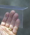 Closeup of a clear plastic covering on a New Windsor crawl space block wall