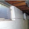 A foundation showing severe inward buckling along the windows in a Beacon home.