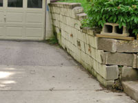 a failing retaining wall around a driveway in Poughkeepsie