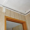 The ceiling and wall separating as the wall sinks with the slab floor in a New Paltz home