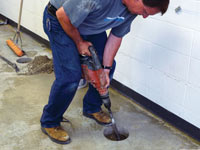 Coring the concrete of a concrete slab floor in Suffern