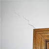 wall cracks along a doorway in a Saugerties home.