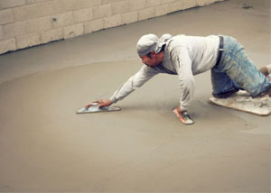 smoothing out the grout in a slab releveling project in Wappingers Falls