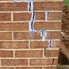 Tuckpointing that cracked due to foundation settlement of a Middletown home