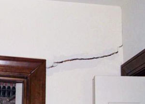 A large drywall crack in an interior wall in Kingston