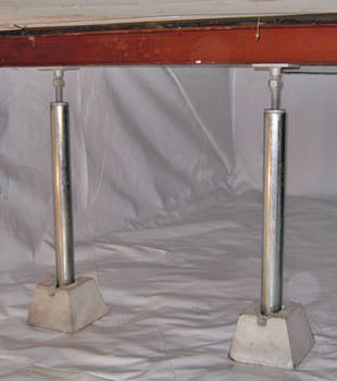 Crawl space jack posts installed in conjunction with a crawl space vapor barrier in Red Hook
