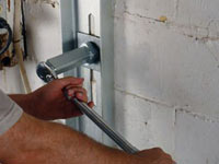 Mounting a foundation wall channel anchor in Wappingers Falls.