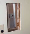 Wall anchor plates installed during a foundation repair in Middletown in a finished basement