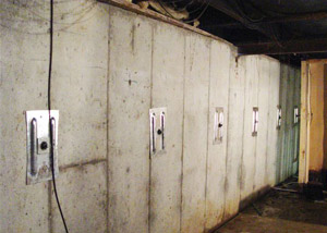 A foundation wall in Monticello repaired with foundation wall anchors.