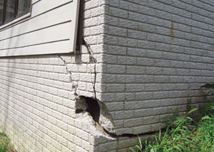 A severely damaged foundation wall in New City