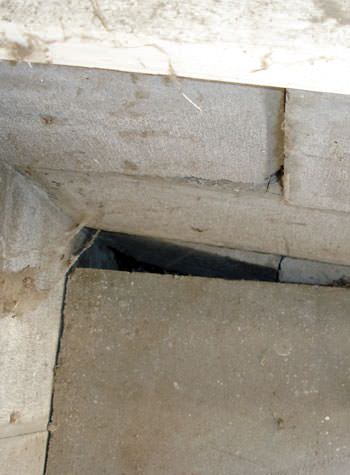 inward rotation of a foundation wall damaged by street creep in a garage in Highland