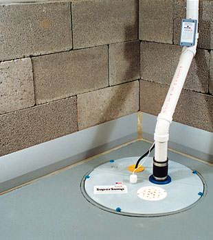 A baseboard basement drain pipe system installed in New Windsor