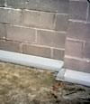 Our baseboard drain system installed on a corner in a New City basement.