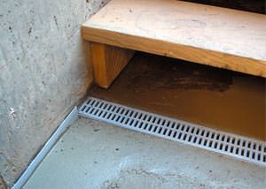 a hatchway entrance in Pearl River that has been protected from flooding by our TrenchDrain basement drainage system.