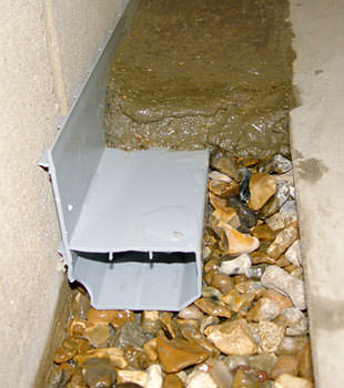 A basement drain system installed in a Wappingers Falls home
