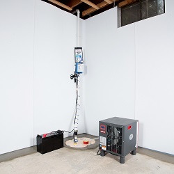 a complete basement waterproofing system installed in a Middletown home