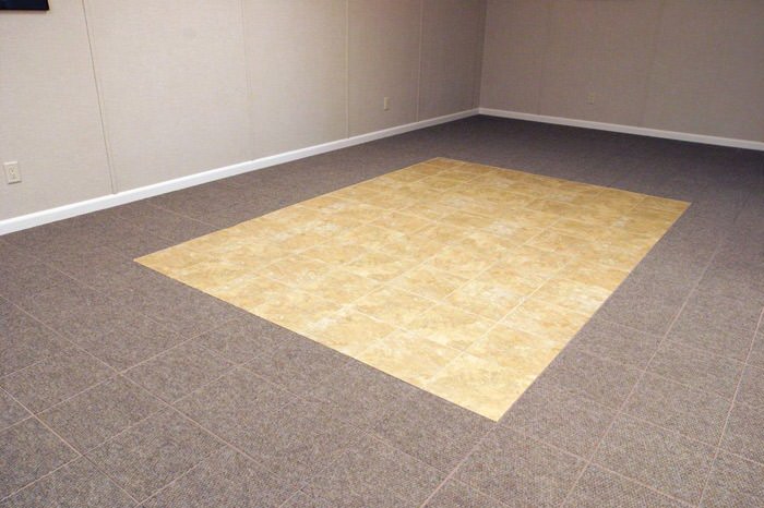 tiled and carpeted basement flooring installed in a Spring Valley home
