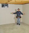 Wappingers Falls basement insulation covered by EverLast™ wall paneling, with SilverGlo™ insulation underneath