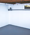 Newburgh, NY wet basement wall covering that tucks into a perimeter drainage system